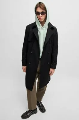 Water-repellent trench coat with buckled belt